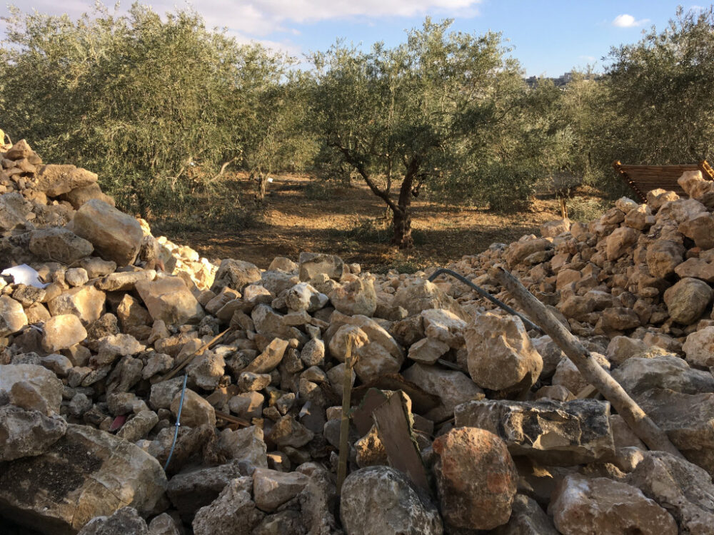 The remains of a toilet and washroom after a demolition in Battir