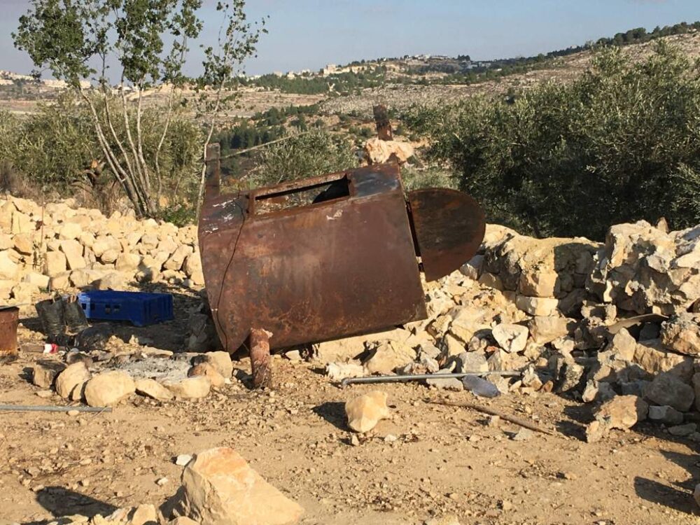 The remains of a traditional taboun oven after a demolition in Battir