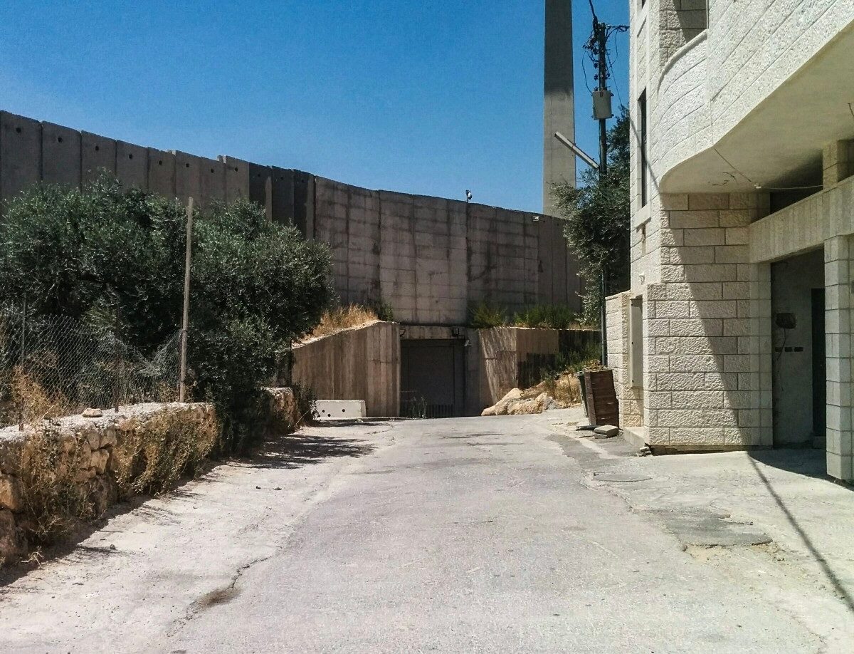 The Separation barrier right outside a Palestinian family home