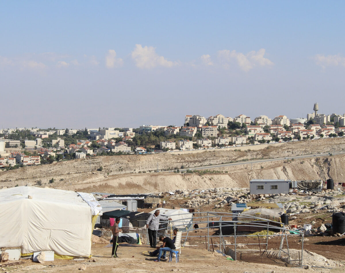 The Israeli settlement of Maale Adumim in the background, the Palestinian village of Jabal al Baba in the foreground
