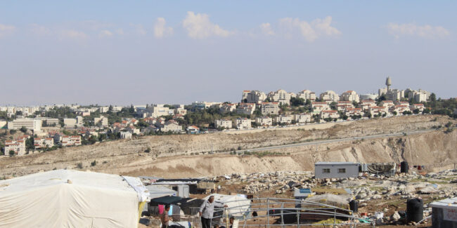 The Israeli settlement of Maale Adumim in the background, the Palestinian village of Jabal al Baba in the foreground