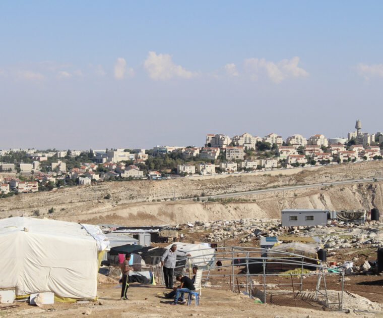 The Israeli settlement of Maale Adumim in the background, the Palestinian village of Jabal al Baba in the foreground