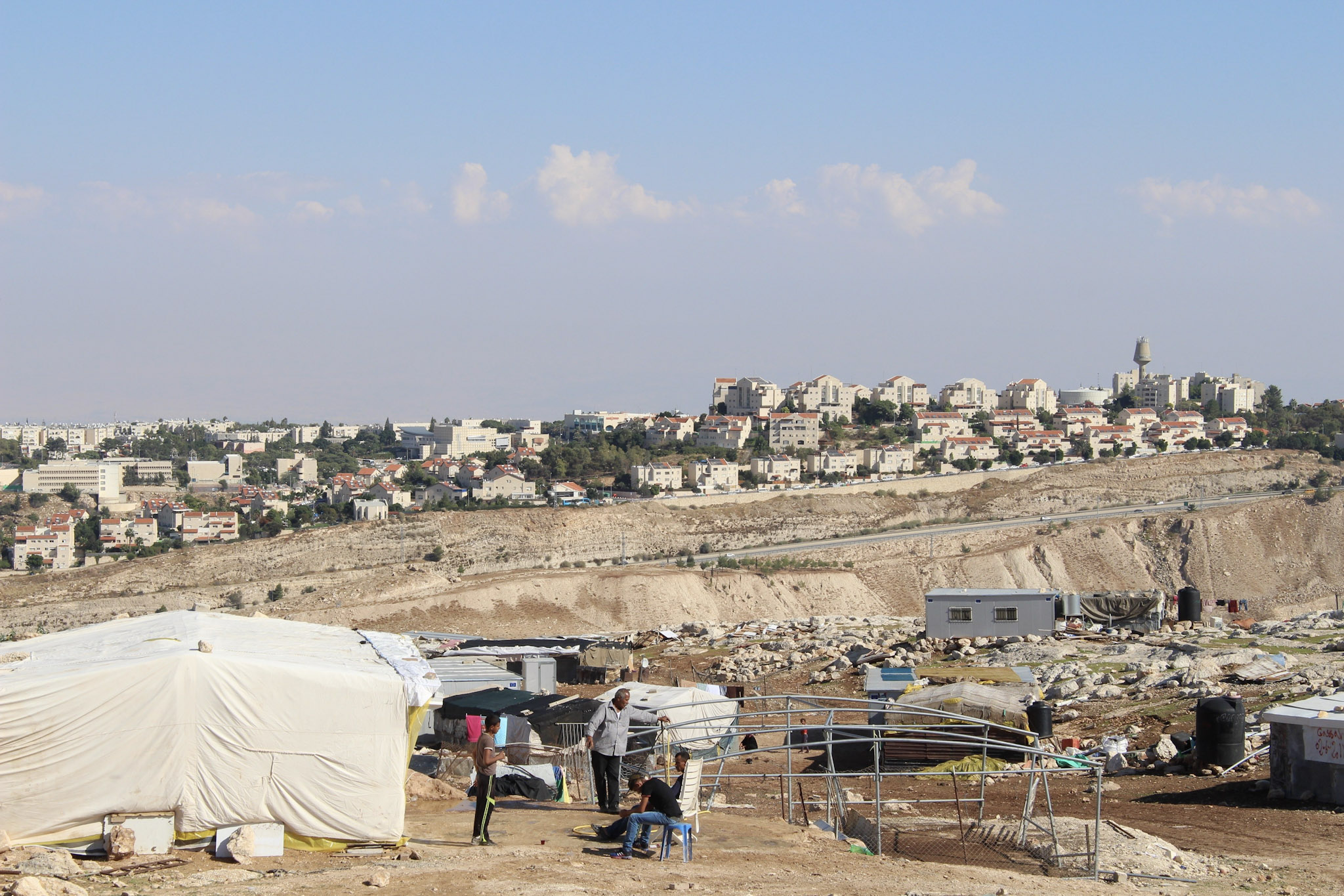 The Israeli settlement of Maale Adumim in the background, the Palestinian village of Jabal al Baba in the foreground