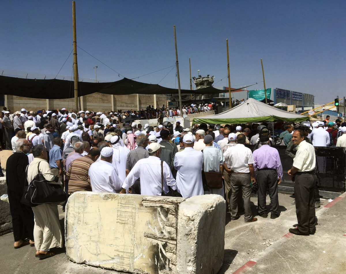 Queues at Qalandiya checkpoint on the last Friday in Ramadan