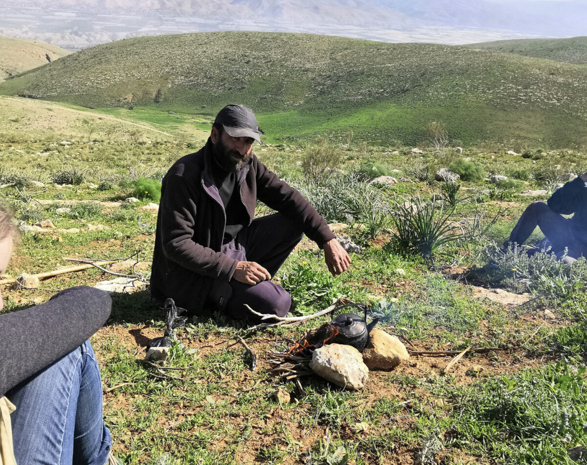 Fawsi making tea in his fields in Khirbet Samra