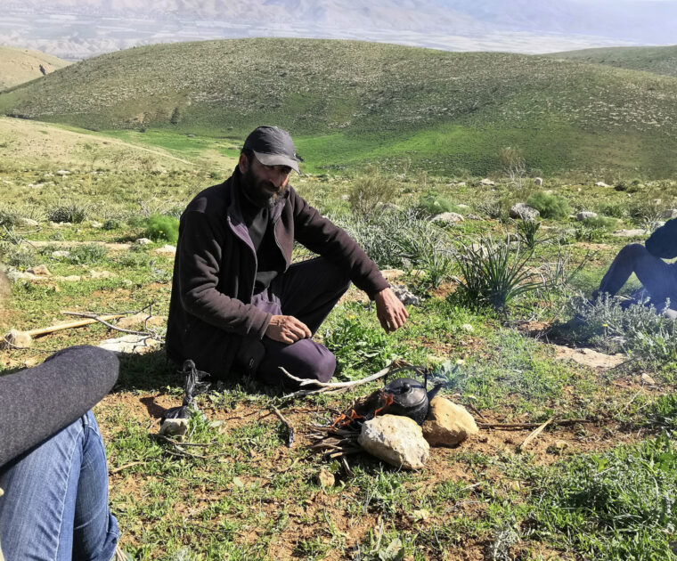 Fawsi making tea in his fields in Khirbet Samra