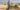 Ibrahim Damras stands in front of his land taken for a settlement date plantation in 2021